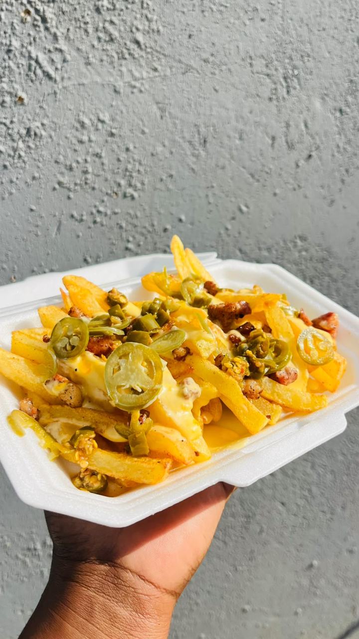 Cheesy bacon jalapeño fries by Mpho Penelope, Barberton