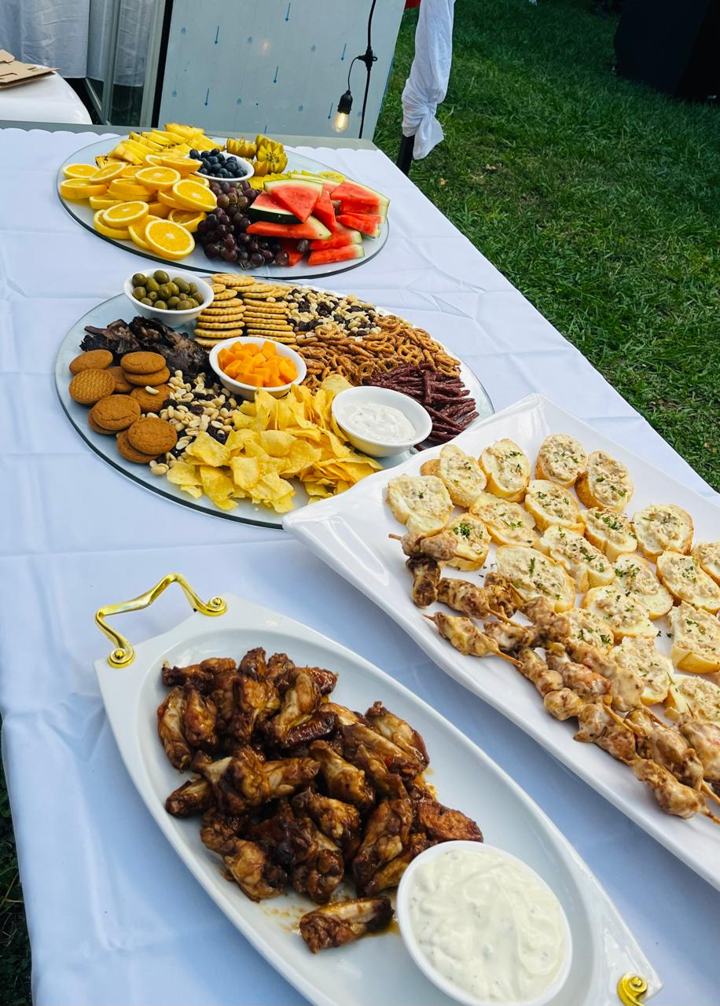 Grazing table catering in Barberton with fruit, cheese, droëwors, wings and skewers